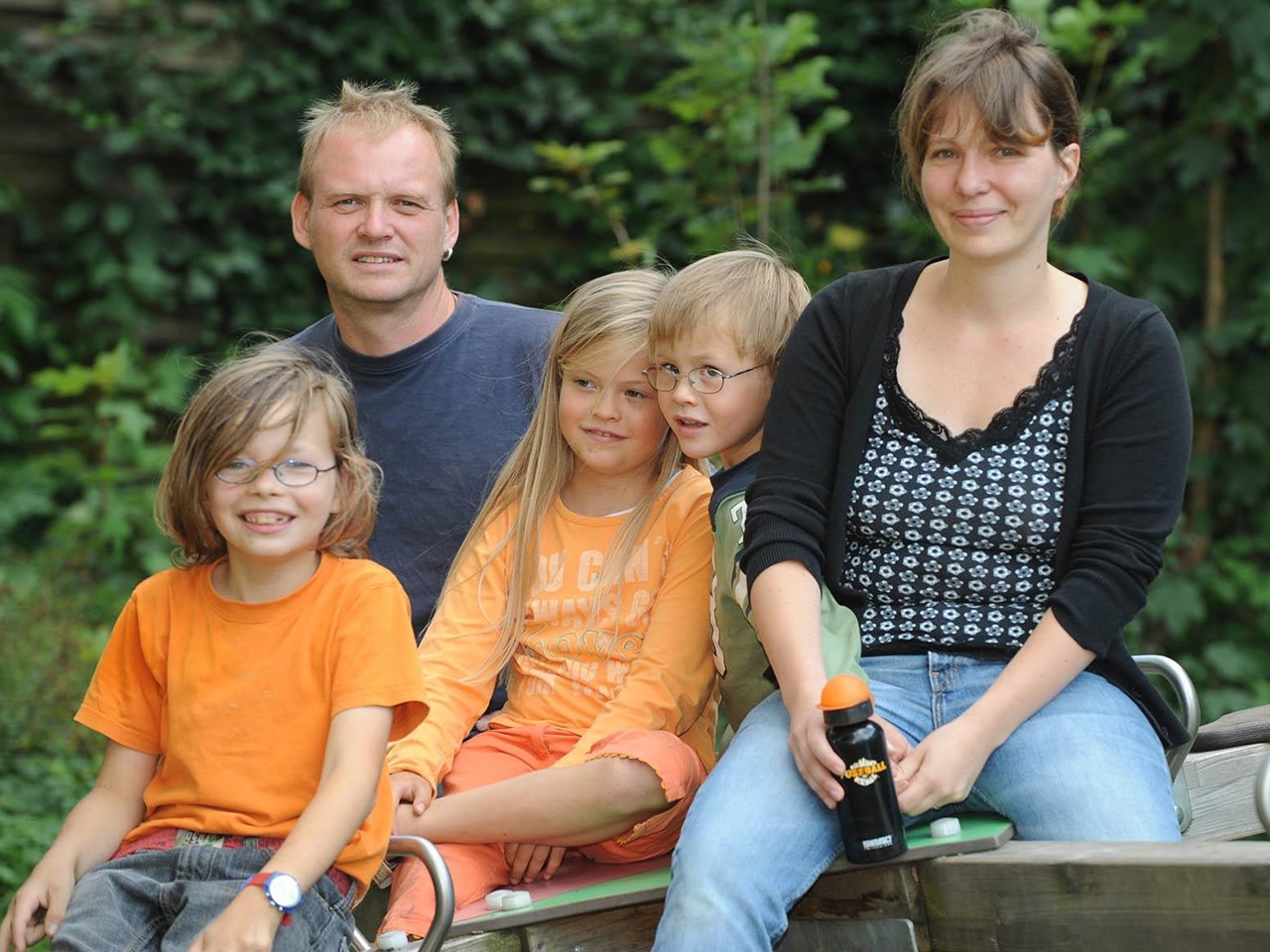 Familie mit drei Kindern